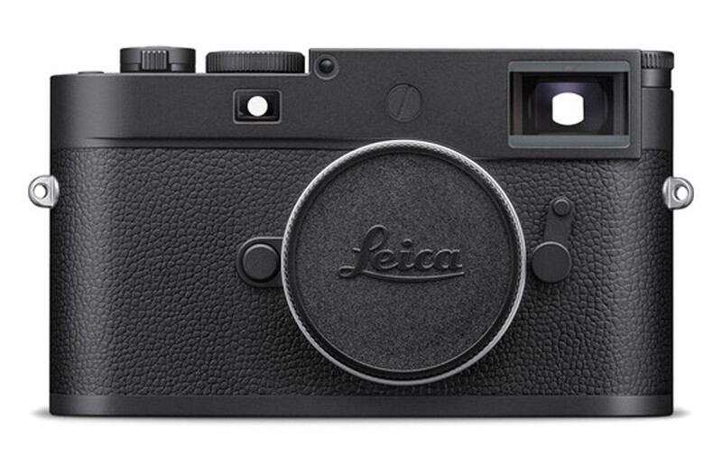 Top-down view of a black Leica rangefinder camera body with textured leather grip and chrome accents.