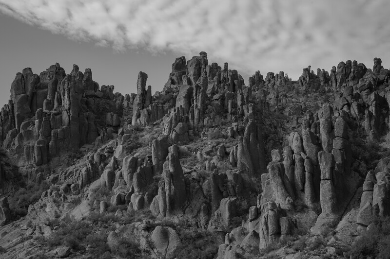 Arizona hillside with rock formations in black and white