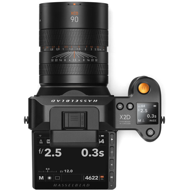 Hasselblad medium format camera with 90mm lens mounted, displaying exposure settings on LCD screen.