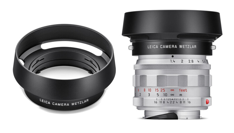 Leica Camera Wetzlar lens with matching lens hood shown separately against white background.