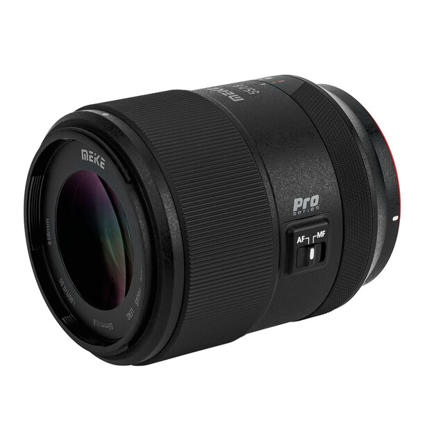 Black telephoto lens with professional optics and autofocus markings visible on the barrel.