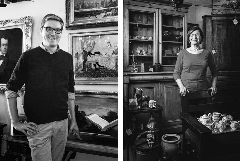 Two black and white portraits of people in interior settings with artwork and collectibles.