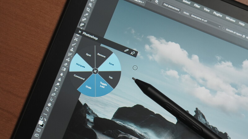 Screenshot of Photoshop with a color wheel adjustment tool open over a landscape image of mountains and ocean.