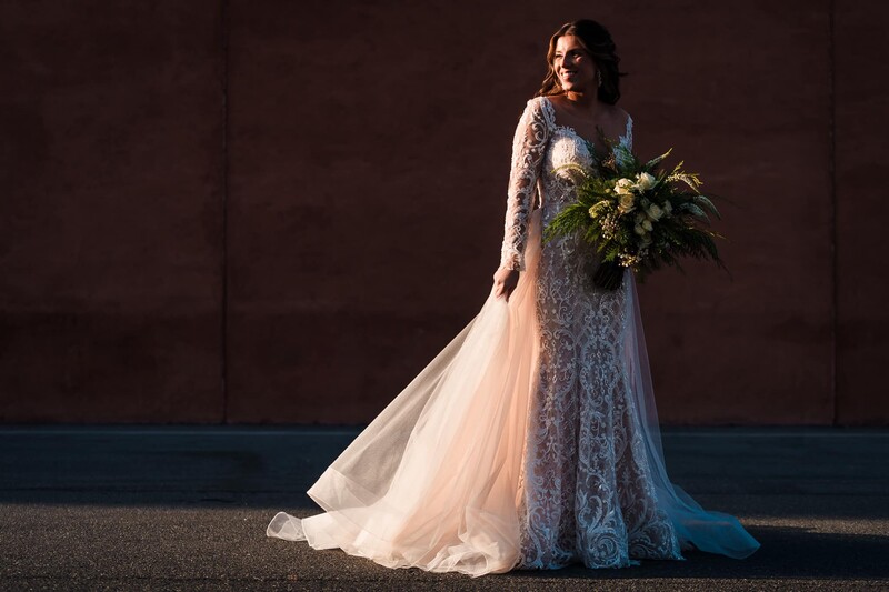 Bride looks back in shadows and light