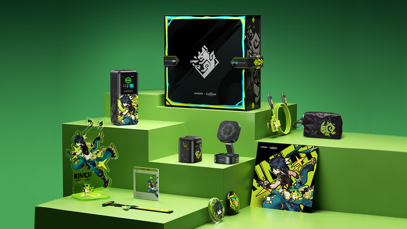 Product display arrangement featuring merchandise in black and neon yellow on tiered green platforms.