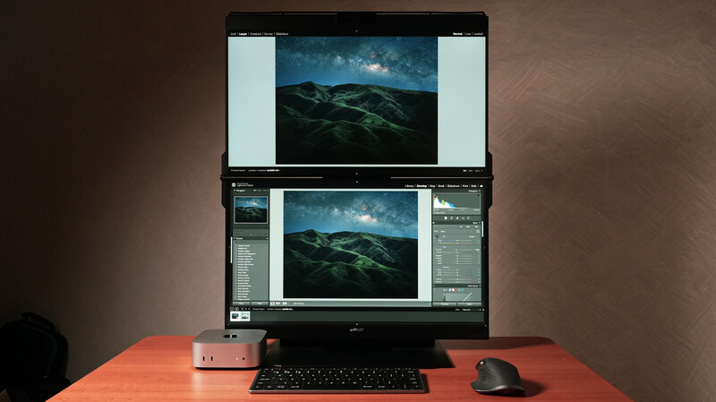 Dual monitor setup displaying landscape photo editing workflow with mountain imagery.