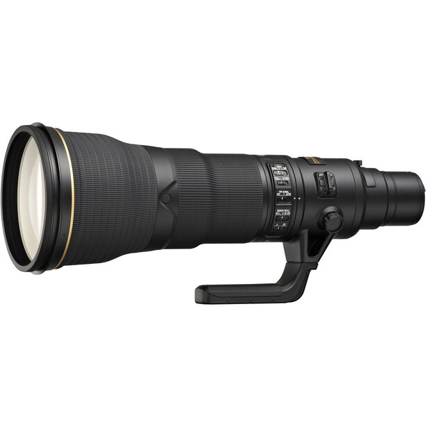 Black telephoto lens with focus ring and distance scale markings against white background.