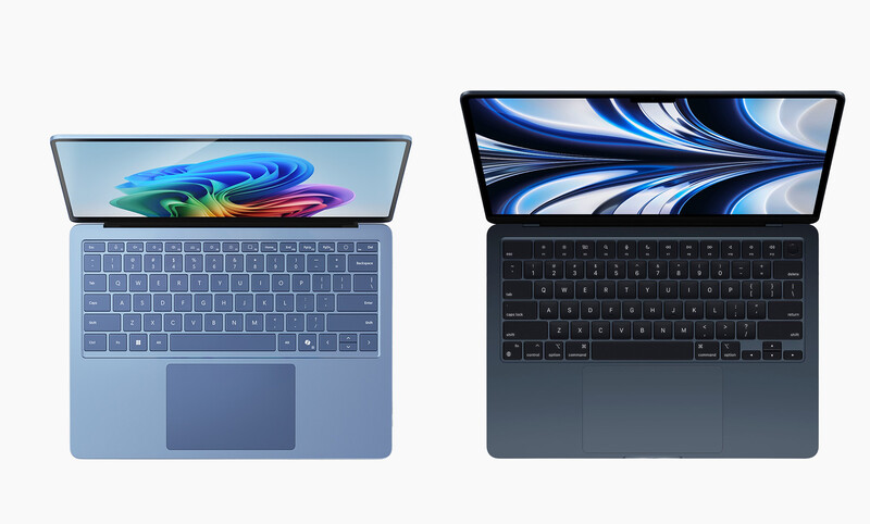 Illustration comparing two laptop computers viewed from above, showing their keyboards and displays side by side.