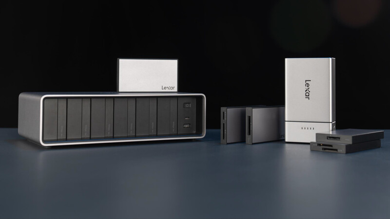 Collection of Lenovo storage and networking devices arranged on a dark surface.