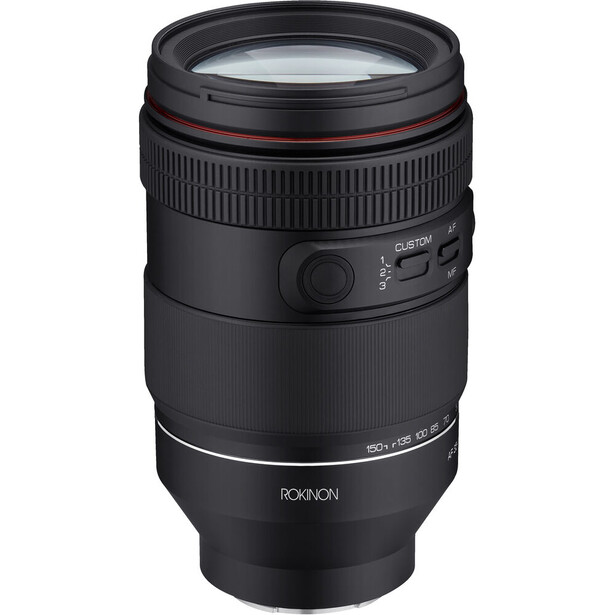 Canon RF-mount telephoto lens with red accents and AF/MF switch visible on the barrel.