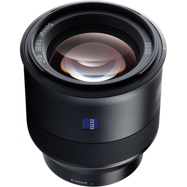 Zeiss Milvus prime lens with black barrel and glass optics visible through the front element.
