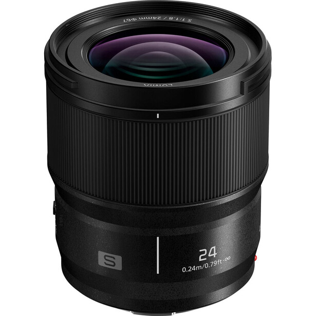 Black prime lens with 24mm focal length and wide aperture, shown against white background.