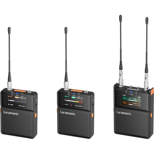 Three black wireless lavalier microphone transmitter units with antennas displayed against a white background.