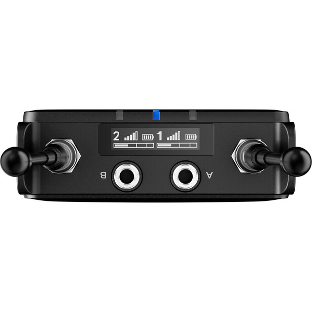 Top view of a black audio interface with dual analog input knobs, two white level meters, and illuminated indicator lights.