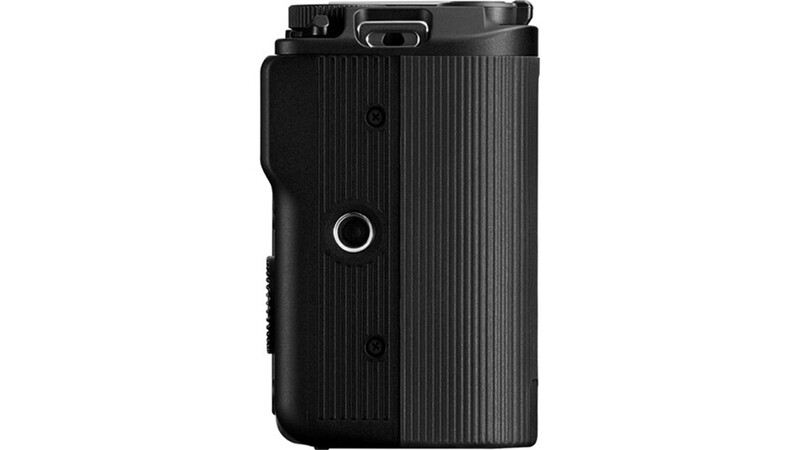 Compact digital camera with black ribbed body and silver accents, shown from the side against a white background.