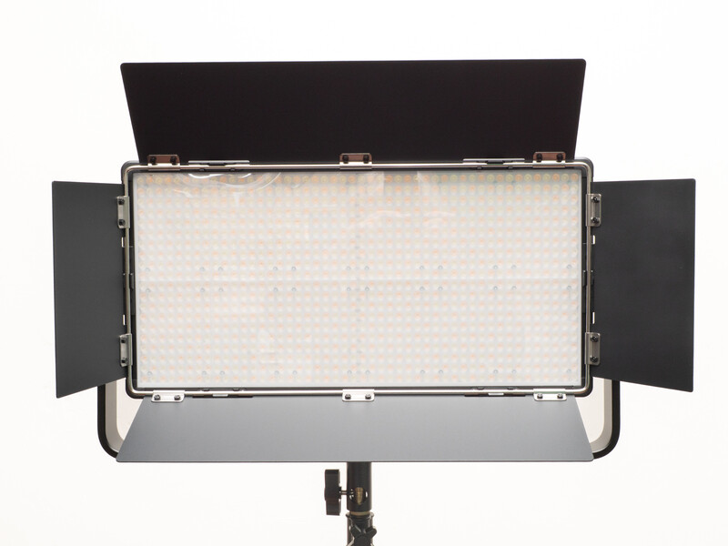 Large LED panel light with open diffuser and side wings viewed from front.