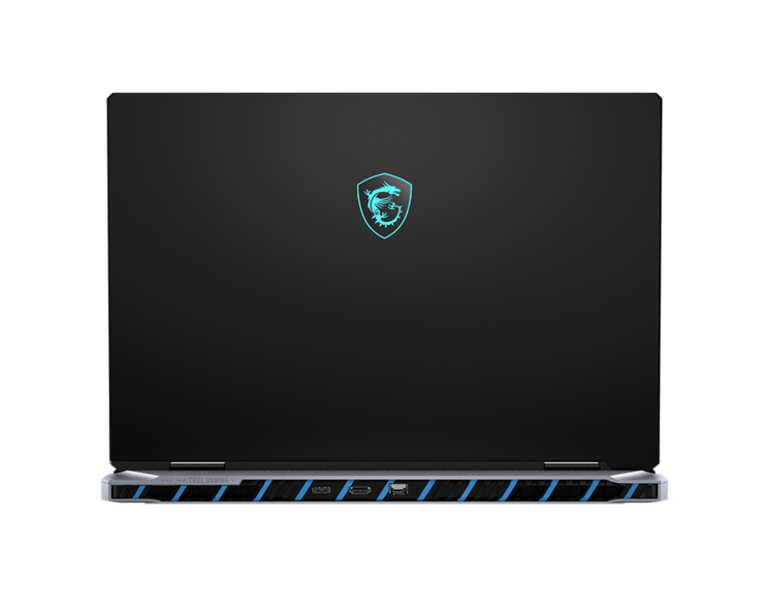 Gaming laptop with closed lid displaying glowing shield logo on dark screen.