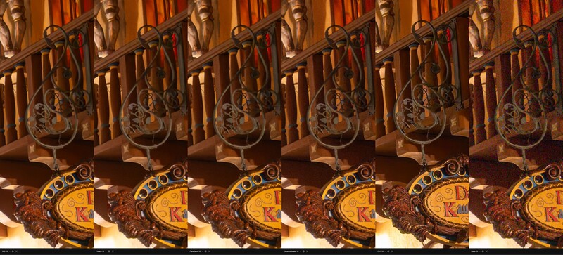 Repeated pattern of ornate brass guitars and decorative medallions with warm golden lighting.