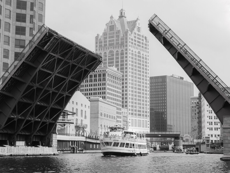 Photograph of the bridges, boats, and buildings around the Milwaukee River
