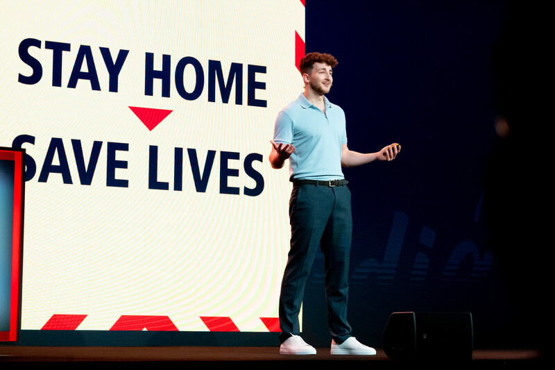 Brandon Baum onstage at Adobe MAX.
