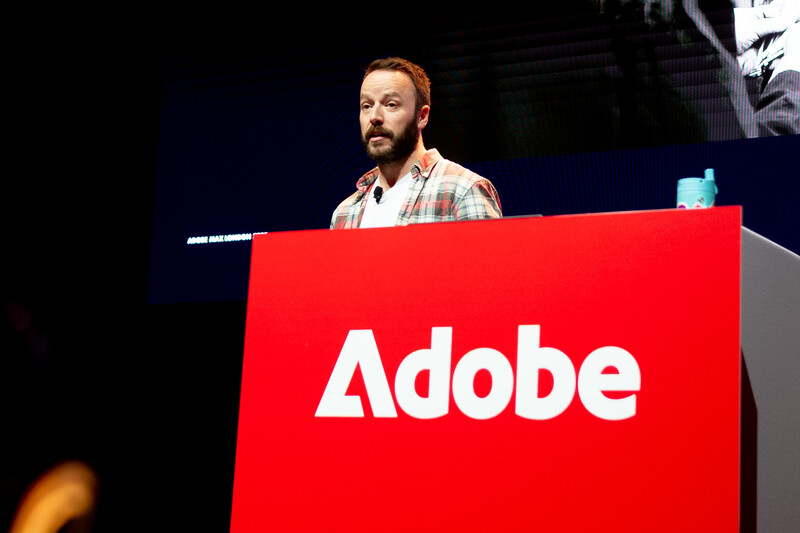 James Barnard onstage at Adobe MAX