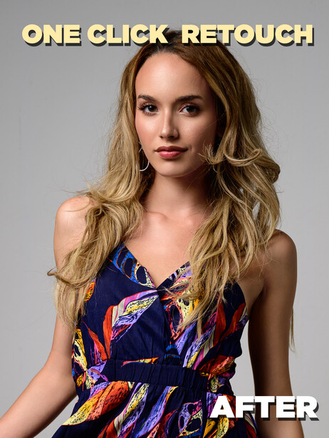 Portrait of a woman with long blonde wavy hair wearing a blue floral dress against a neutral gray background.