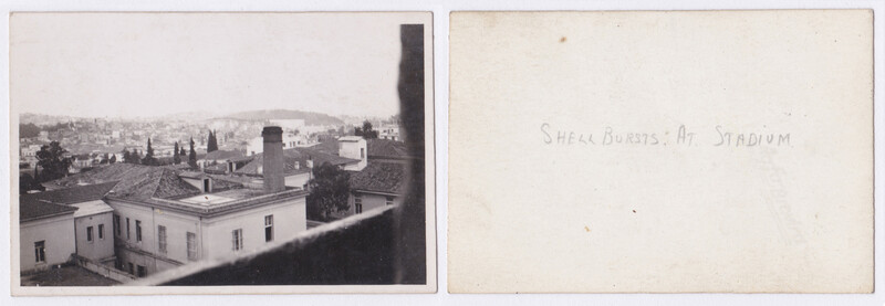 Cityscape view from an elevated rooftop showing buildings, cypress trees, and distant hills in early photography style.