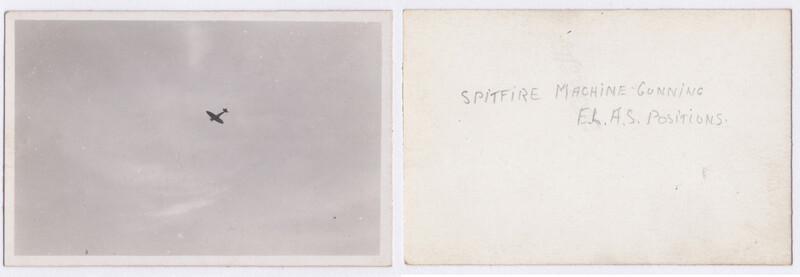 Vintage photograph showing a Spitfire aircraft in flight against an overcast sky.