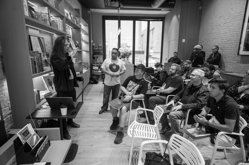 Photographer Bill Brown talking to an audience of photographers