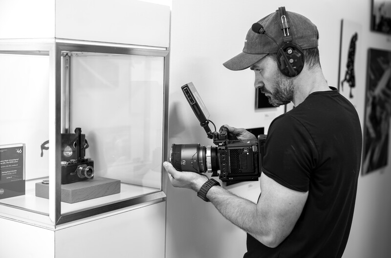 Man filming a rare Leica camera