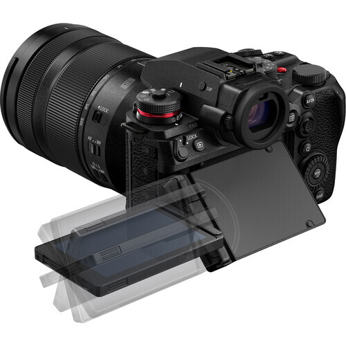 Mirrorless camera with attached zoom lens and articulating rear display screen.