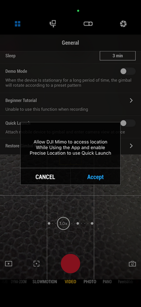 Screenshot of a mobile camera app interface with recording controls and permission dialog box.