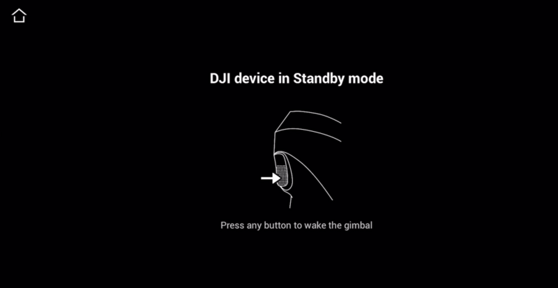 Screenshot showing a DJI device gimbal in standby mode with instructions to press any button to wake it.