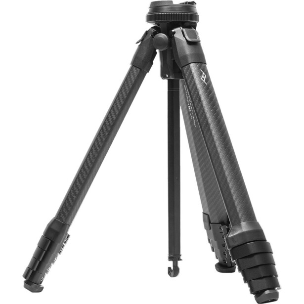 Carbon fiber tripod with extended legs and center column against white background.