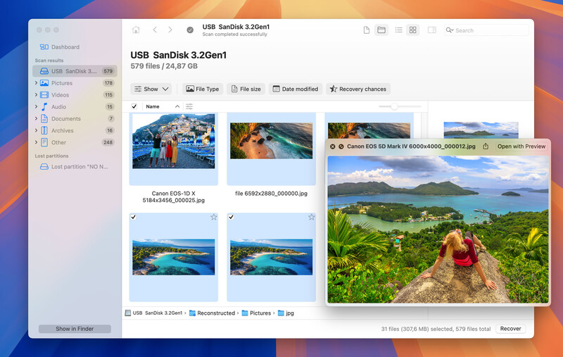 Screenshot of file management software showing a folder of landscape photographs with tropical scenery and mountain views.