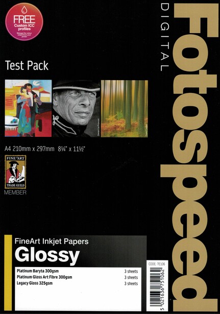Fstoppers Test Pack product box displaying sample photographs and glossy inkjet paper specifications.