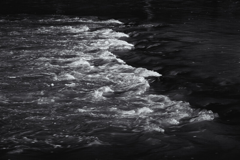 black and white ripples in a river