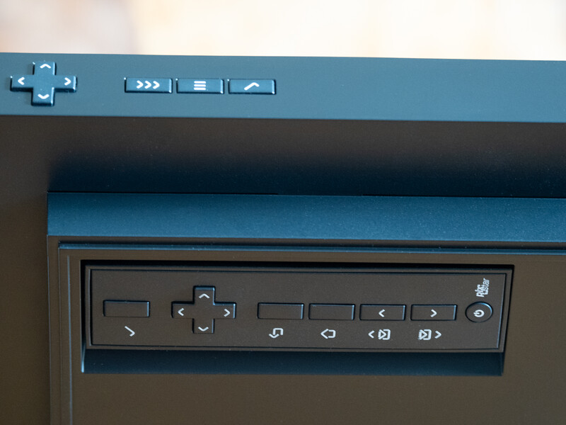 Screenshot of camera control panel with navigation buttons and directional pad interface.