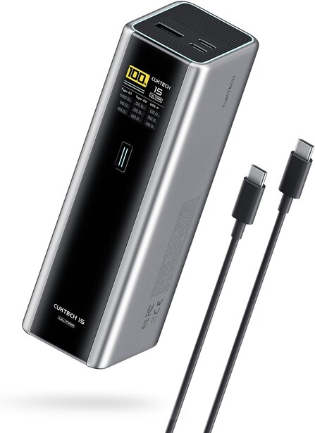 Portable power bank with digital display and two USB-C cables attached.