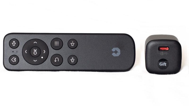 Two black remote controls displayed side by side against a white background.