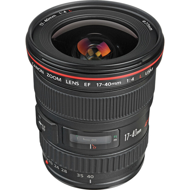 Canon EF 17-40mm f/4L USM wide-angle zoom lens with front element visible against white background.