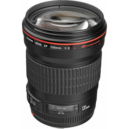 Canon EF 135mm f/2 L telephoto prime lens with front element and focus ring visible.