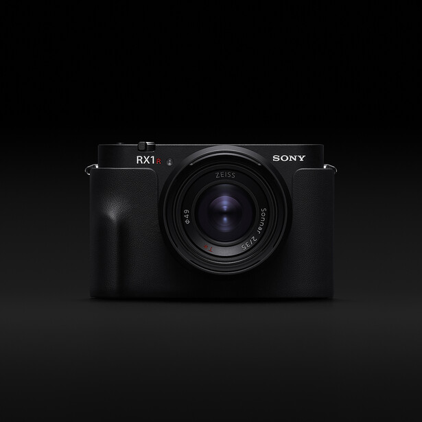 Sony RX1 compact camera with fixed lens, shown against a dark background with dramatic lighting.
