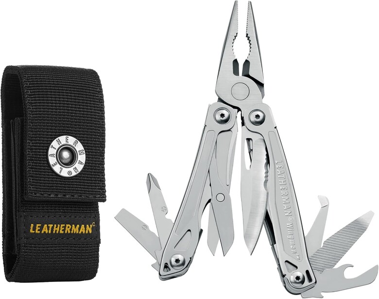 Leatherman stainless steel multi-tool with black nylon carrying sheath displayed fully opened.