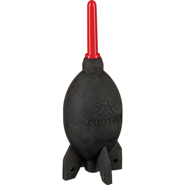 Black rocket-shaped ornament with red pointed top and embossed star design.