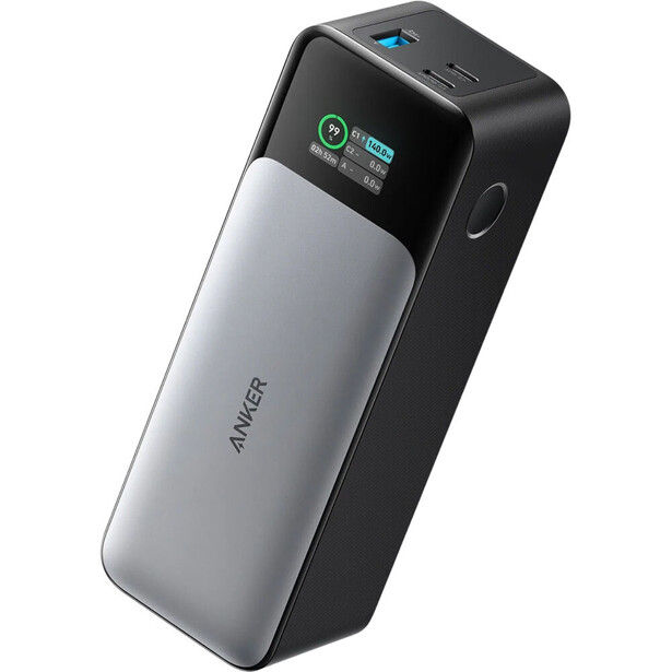 Anker portable power bank with digital display and dual-tone silver and black design.