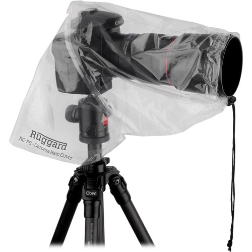 Camera mounted on tripod with clear protective rain cover.