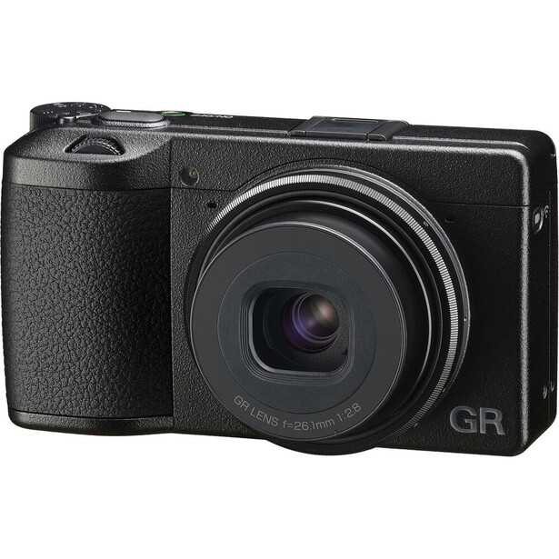 Ricoh GR compact digital camera with fixed lens, shown from three-quarter front view against white background.