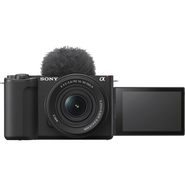 Sony Alpha mirrorless camera with compact zoom lens and articulating touchscreen display extended.