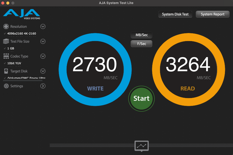 Screenshot of AJA System Test Life disk performance utility displaying write speed of 2730 MB/sec and read speed of 3264 MB/sec.